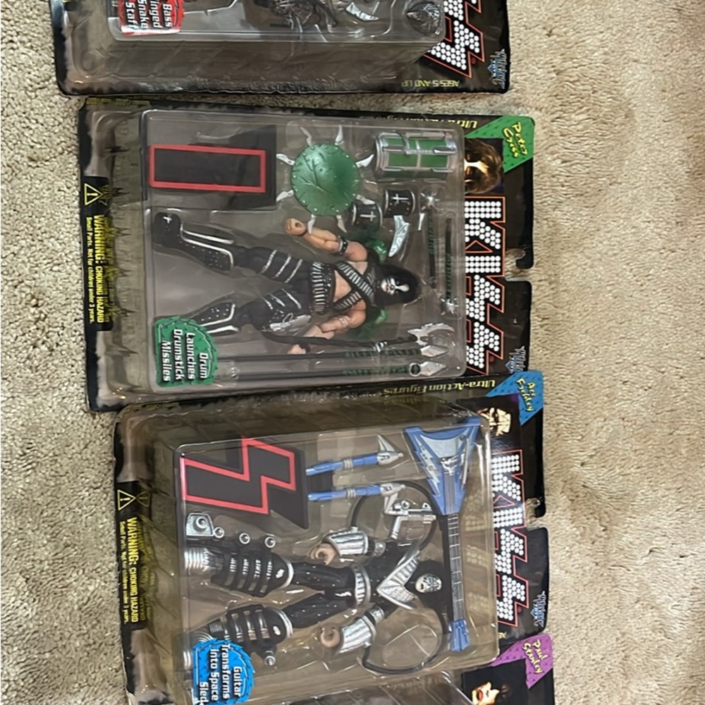 Kiss Collectible Figures with Black and Silver Accents